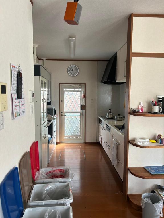 Kuchyň nebo kuchyňský kout v ubytování GuestHouse AIZU