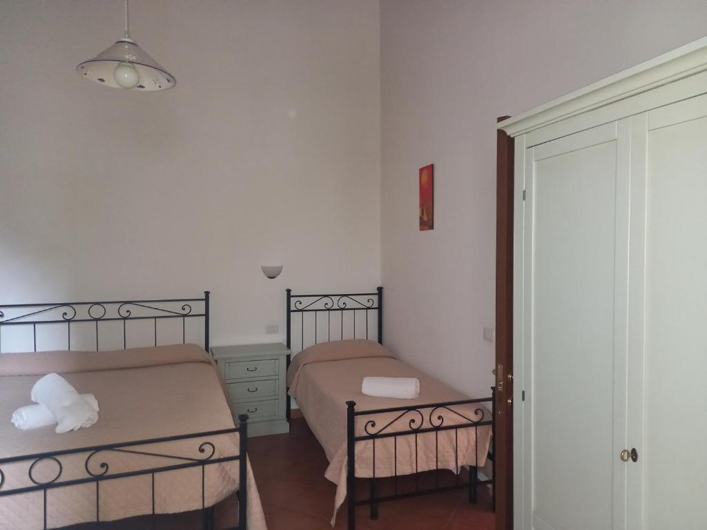 Postel nebo postele na pokoji v ubytování Lumia
