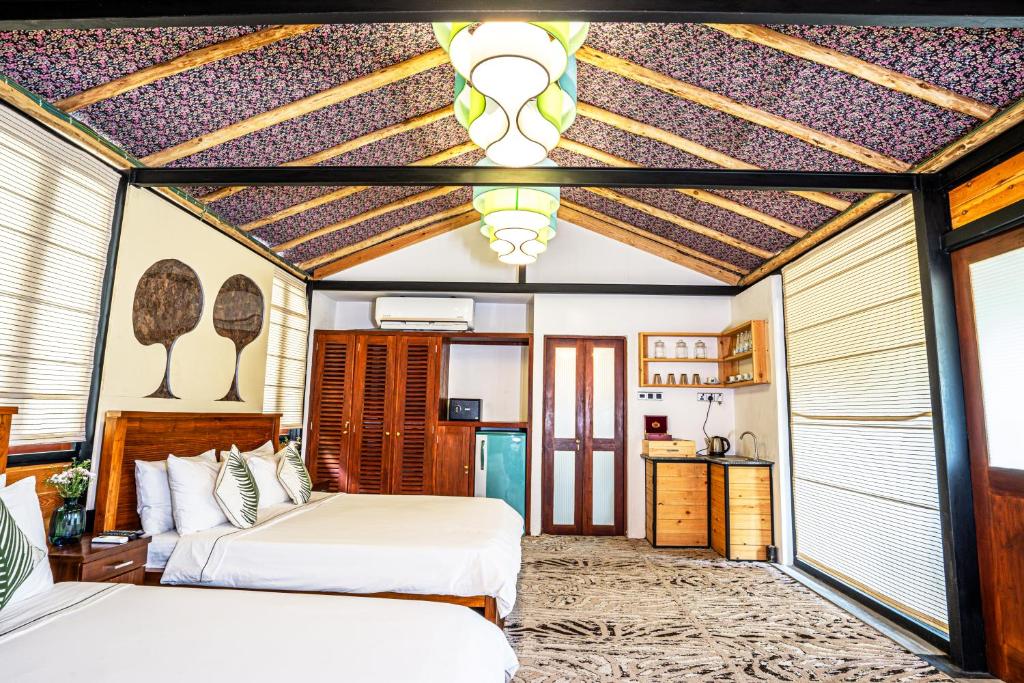 Postel nebo postele na pokoji v ubytování O2 Villas Resort & Spa, Ella