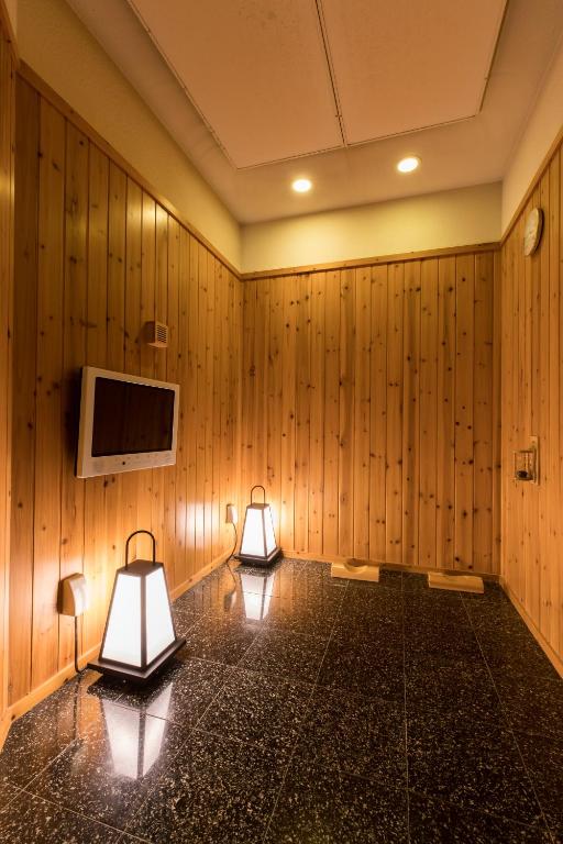 TV a/nebo společenská místnost v ubytování Yatomi Hotel Nuqu Natural Hot Spring
