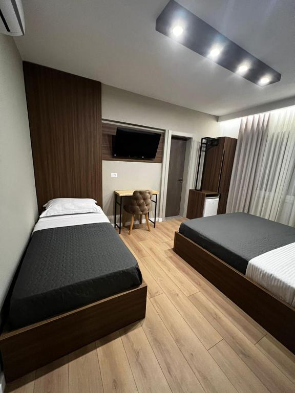 Postel nebo postele na pokoji v ubytování Hotel Ikona