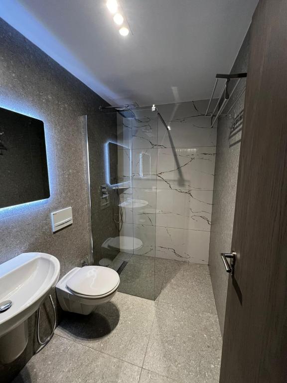 Koupelna v ubytování Hotel Ikona