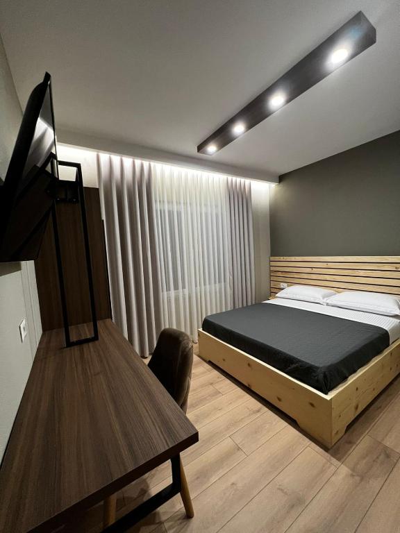 Postel nebo postele na pokoji v ubytování Hotel Ikona