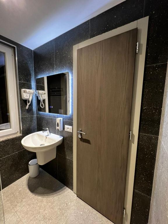 Koupelna v ubytování Hotel Ikona