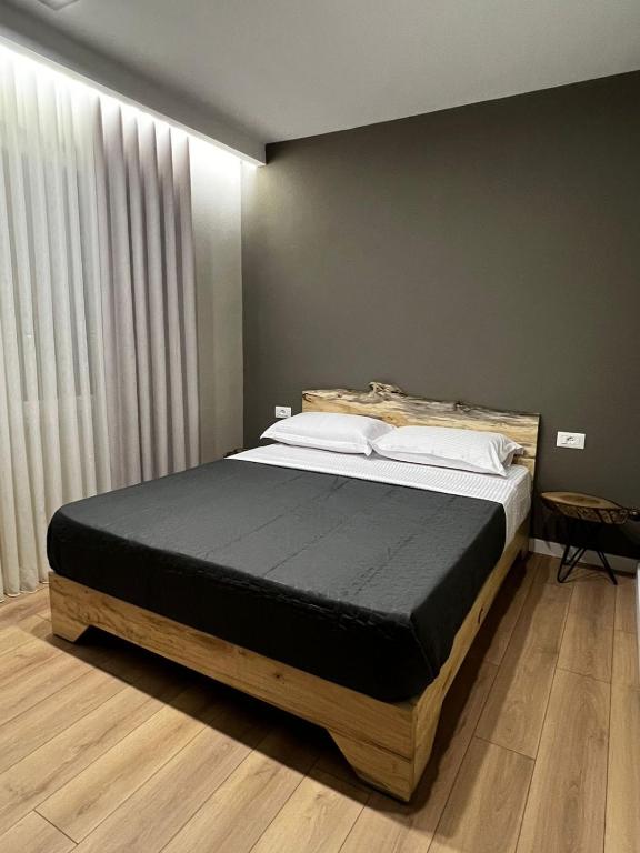 Postel nebo postele na pokoji v ubytování Hotel Ikona