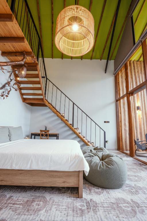 Postel nebo postele na pokoji v ubytování O2 Villas Resort & Spa, Ella