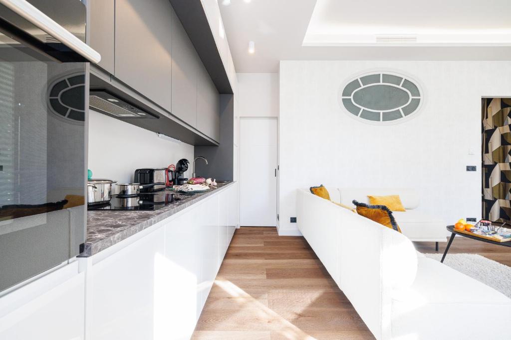 Kuchyň nebo kuchyňský kout v ubytování Vacances Au Palace - Happy Rentals