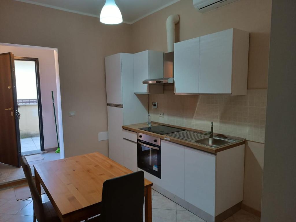 Kuchyň nebo kuchyňský kout v ubytování Attico Via Adriatica Civico 21