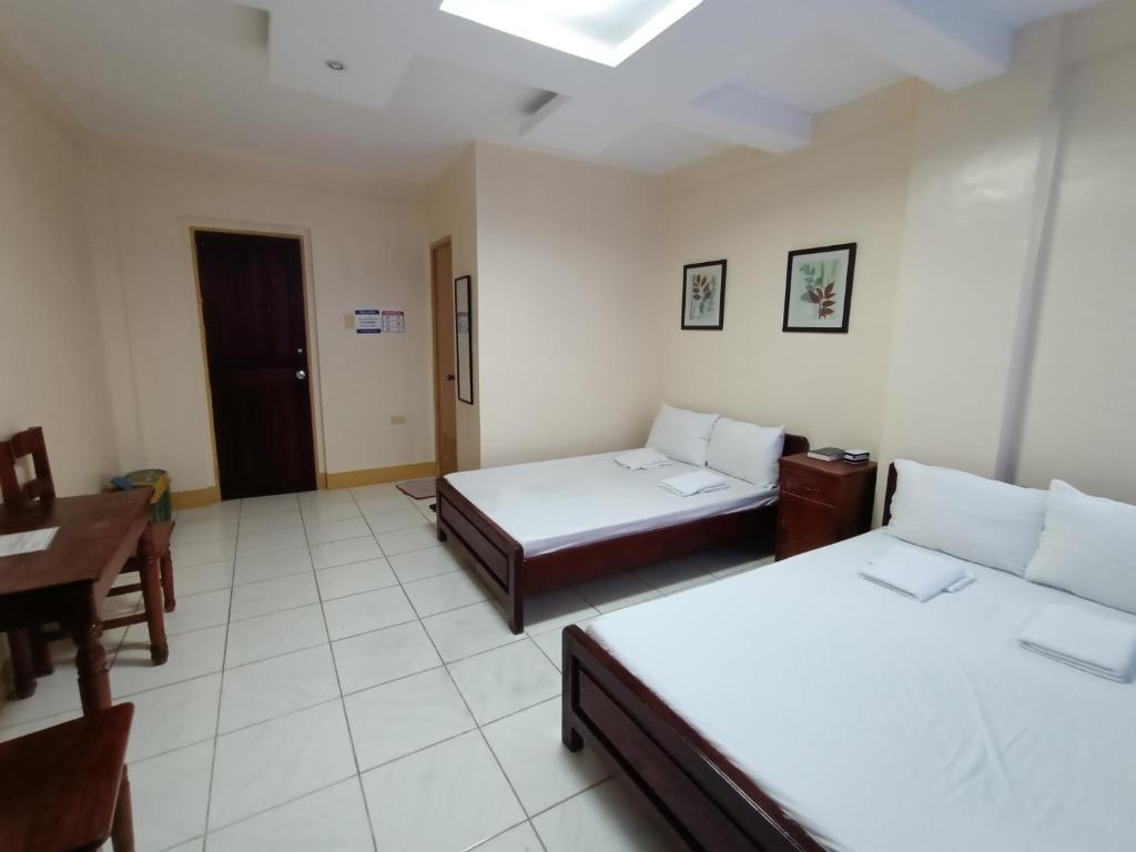 Postel nebo postele na pokoji v ubytování DISADECO Hostel