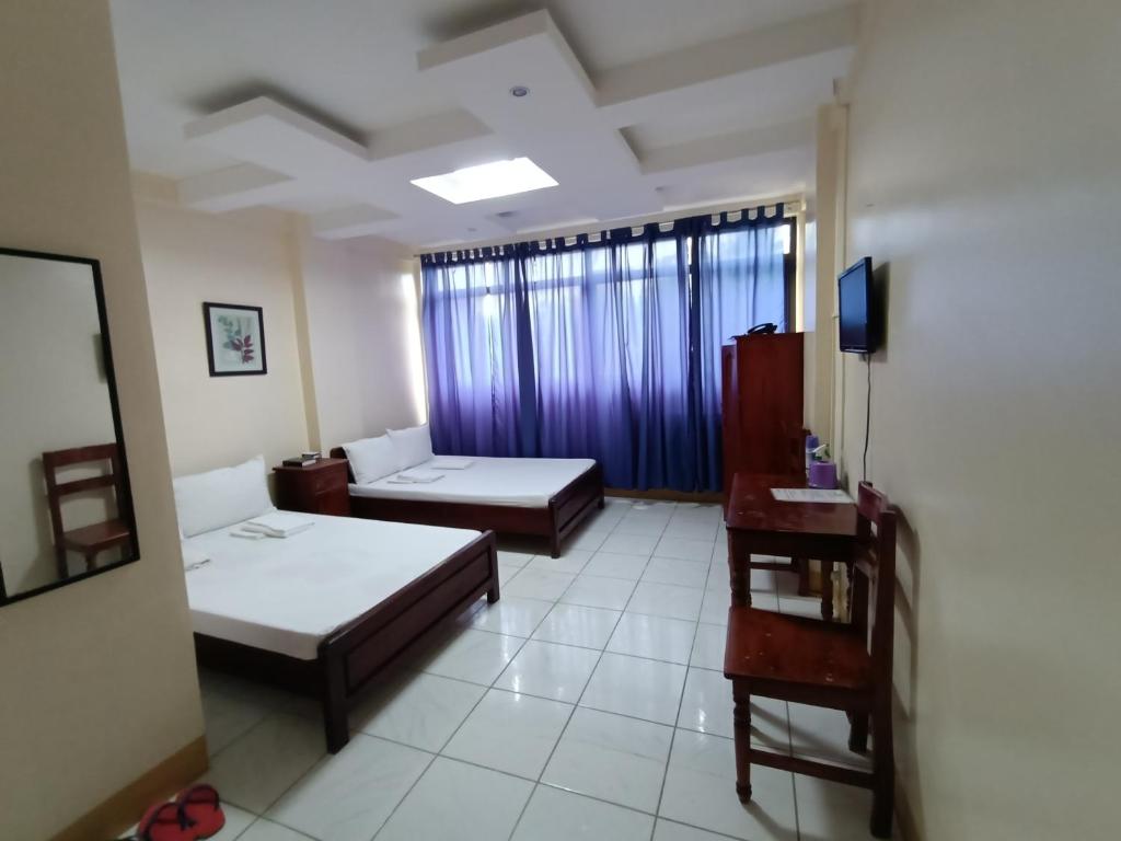 Postel nebo postele na pokoji v ubytování DISADECO Hostel