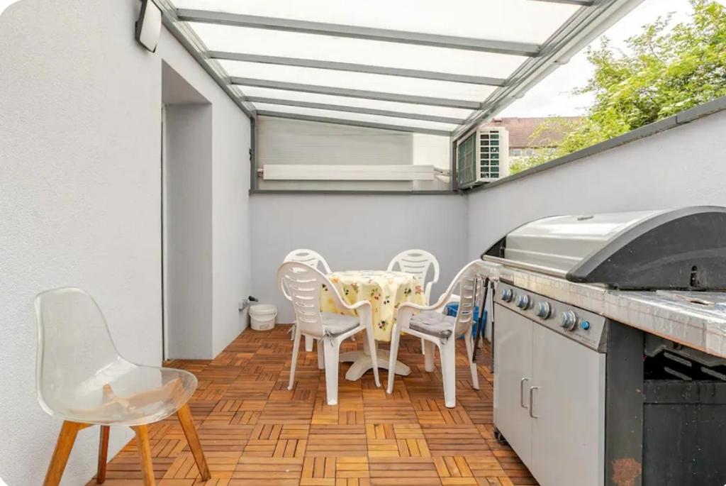 Fotografie z fotogalerie ubytování Maisonnette avec terrasse ve Štrasburku