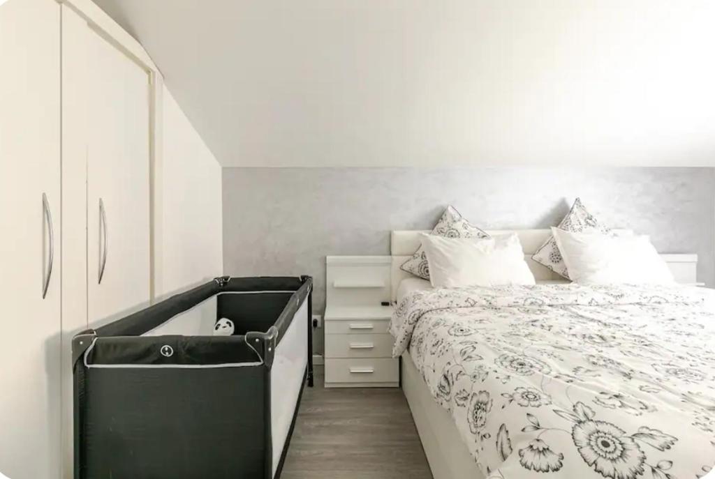 Postel nebo postele na pokoji v ubytování Maisonnette avec terrasse