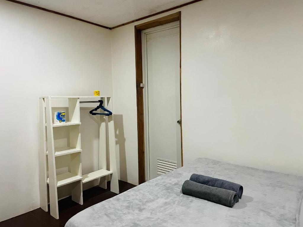 Postel nebo postele na pokoji v ubytování Travis Post Homestay