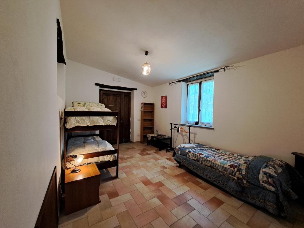 Postel nebo postele na pokoji v ubytování Agriostello Murera