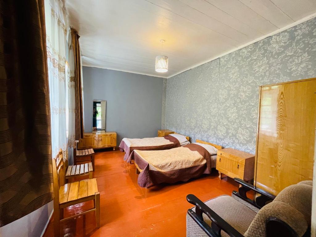 Postel nebo postele na pokoji v ubytování Guesthouse am Museum