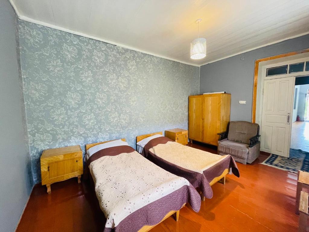 Postel nebo postele na pokoji v ubytování Guesthouse am Museum