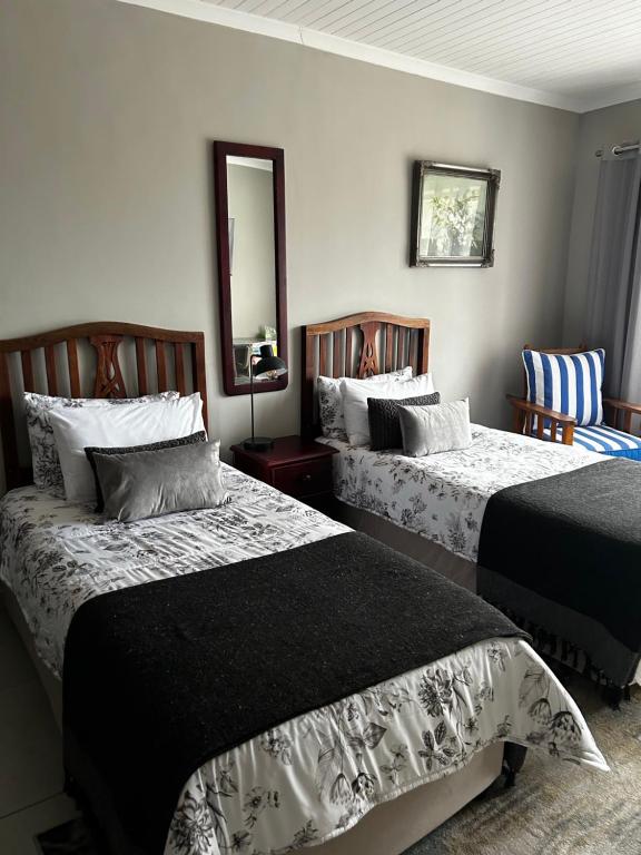 Letto o letti in una camera di Guesthouse Grace At The Bay