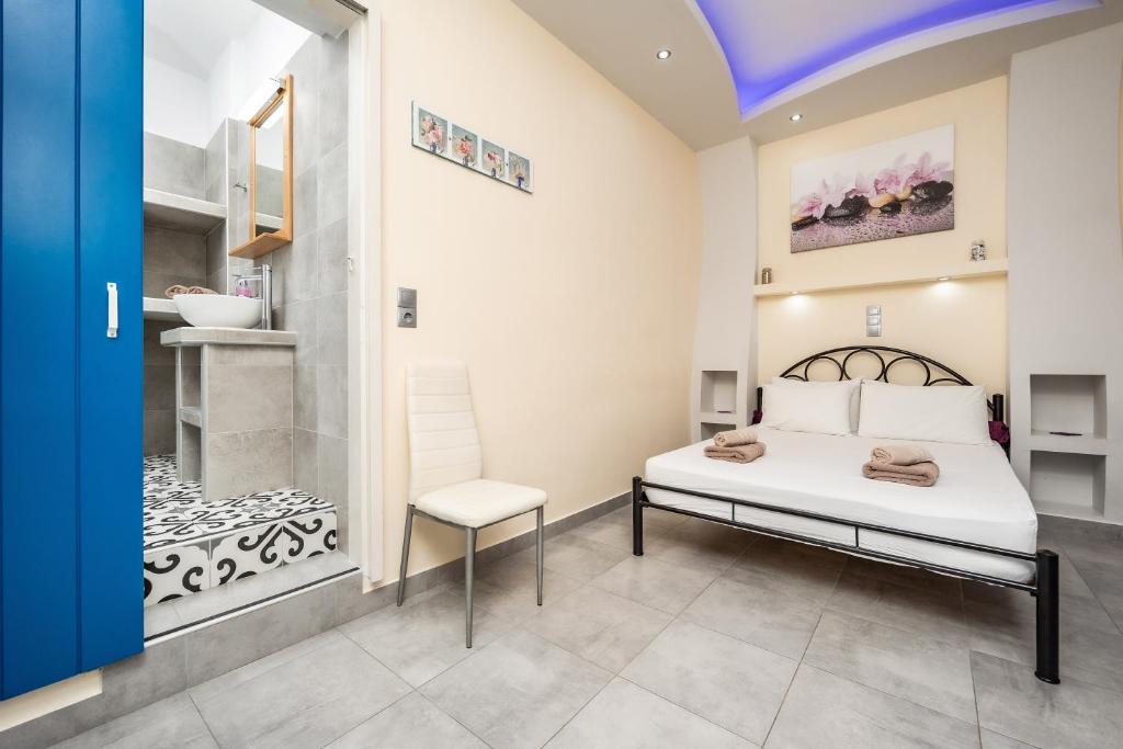 Posteľ alebo postele v izbe v ubytovaní Lefkes Studios