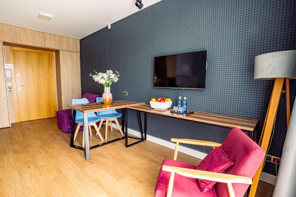 TV a/nebo společenská místnost v ubytování Mielenko & Spa ex Baltin Hotel