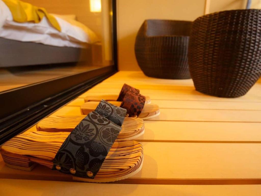Postel nebo postele na pokoji v ubytování Tsukino Yado Sara