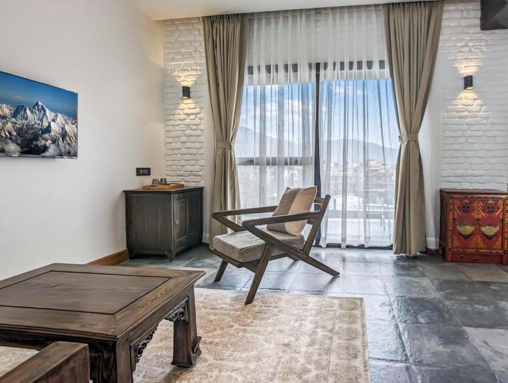 TV a/nebo společenská místnost v ubytování Uma Residence and Suites