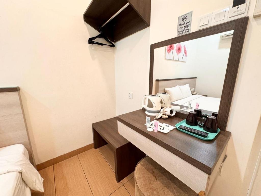 Postel nebo postele na pokoji v ubytování Hotel Sunflower - HLS