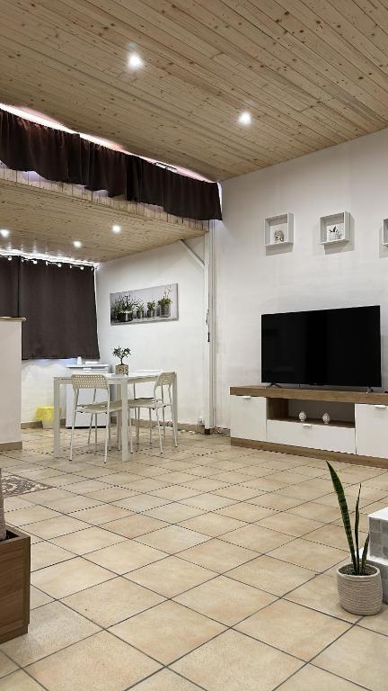 TV a/nebo společenská místnost v ubytování Il Moro