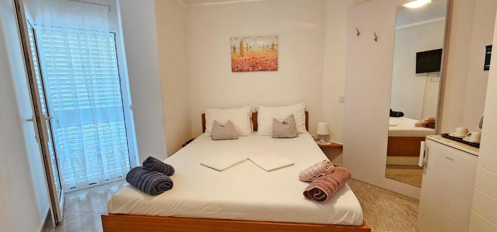 Postel nebo postele na pokoji v ubytování Apartment Tonci