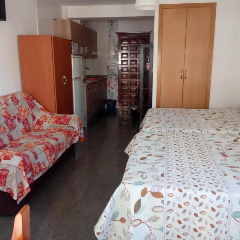 A bed or beds in a room at Estudio Plazamar