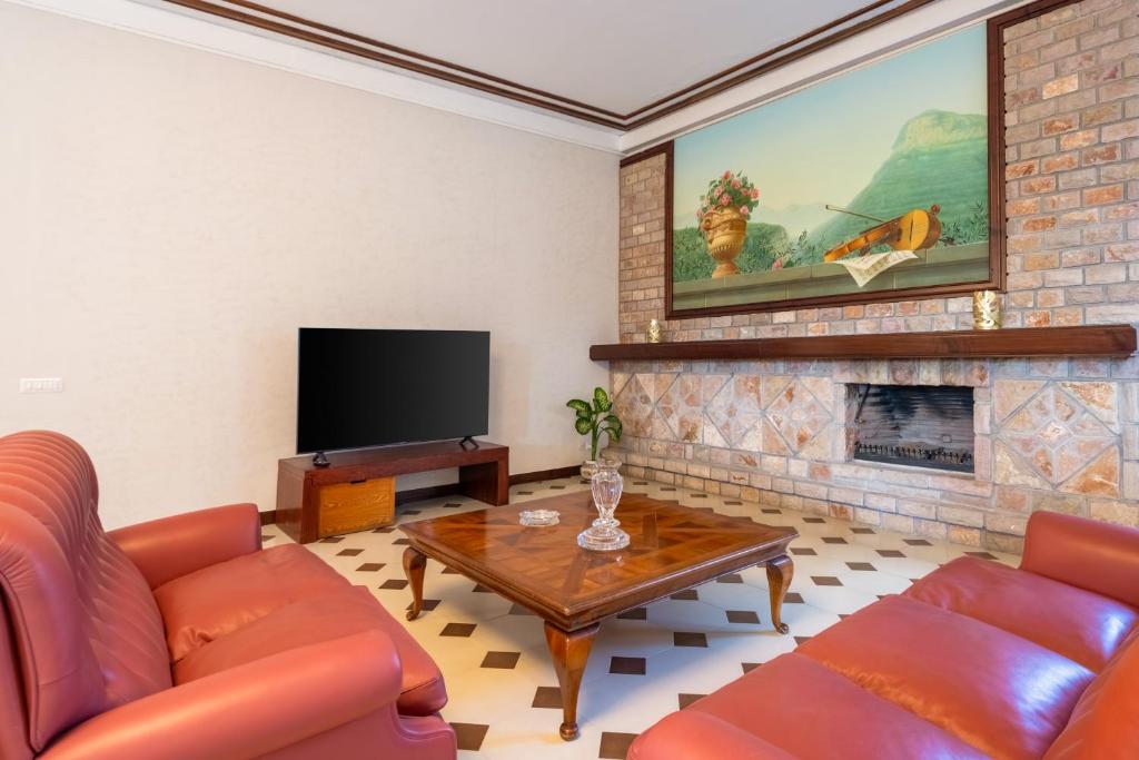 TV a/nebo společenská místnost v ubytování Gargiulo Suites