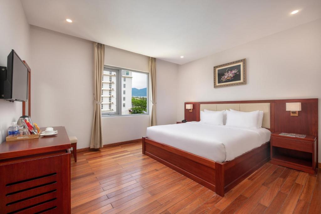 Giường trong phòng chung tại Sekong Hotel Da Nang