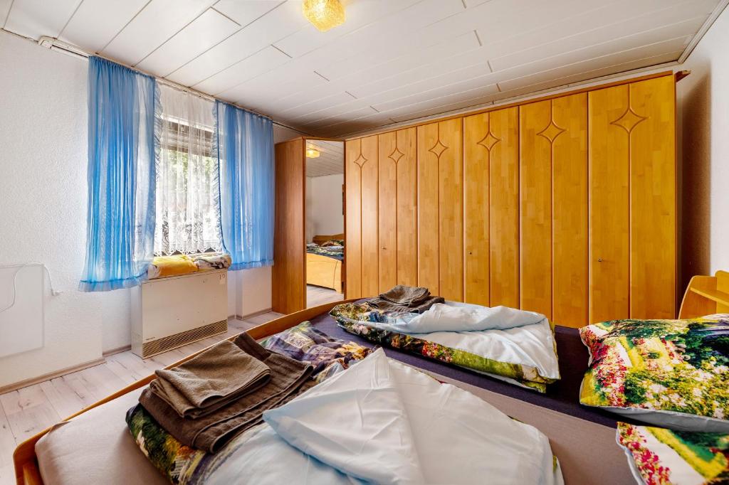 Postel nebo postele na pokoji v ubytování Ferienhaus Eiffelperle
