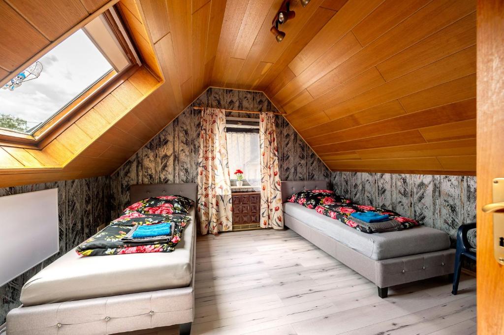 Postel nebo postele na pokoji v ubytování Ferienhaus Eiffelperle