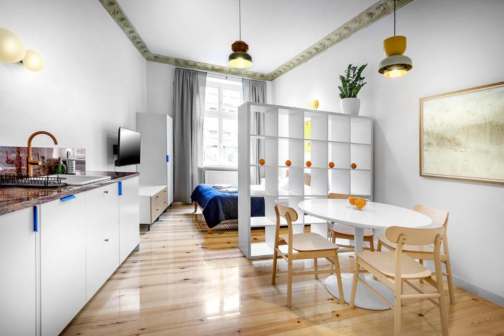 Posedenie v ubytovaní Apartamenty Pomarańczarnia
