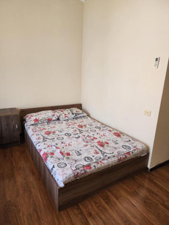 Postel nebo postele na pokoji v ubytování Vizitori Hotel