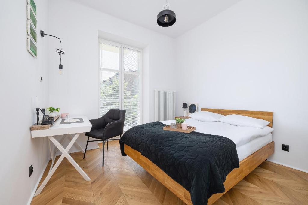 Posteľ alebo postele v izbe v ubytovaní Kraków Apartament Blisko Centrum Kongresowego i Wawelu by Noclegi Renters