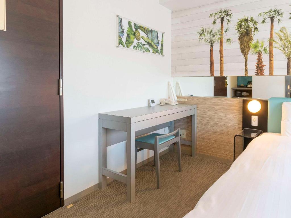 Postel nebo postele na pokoji v ubytování Comfort Inn Naha Tomari Port