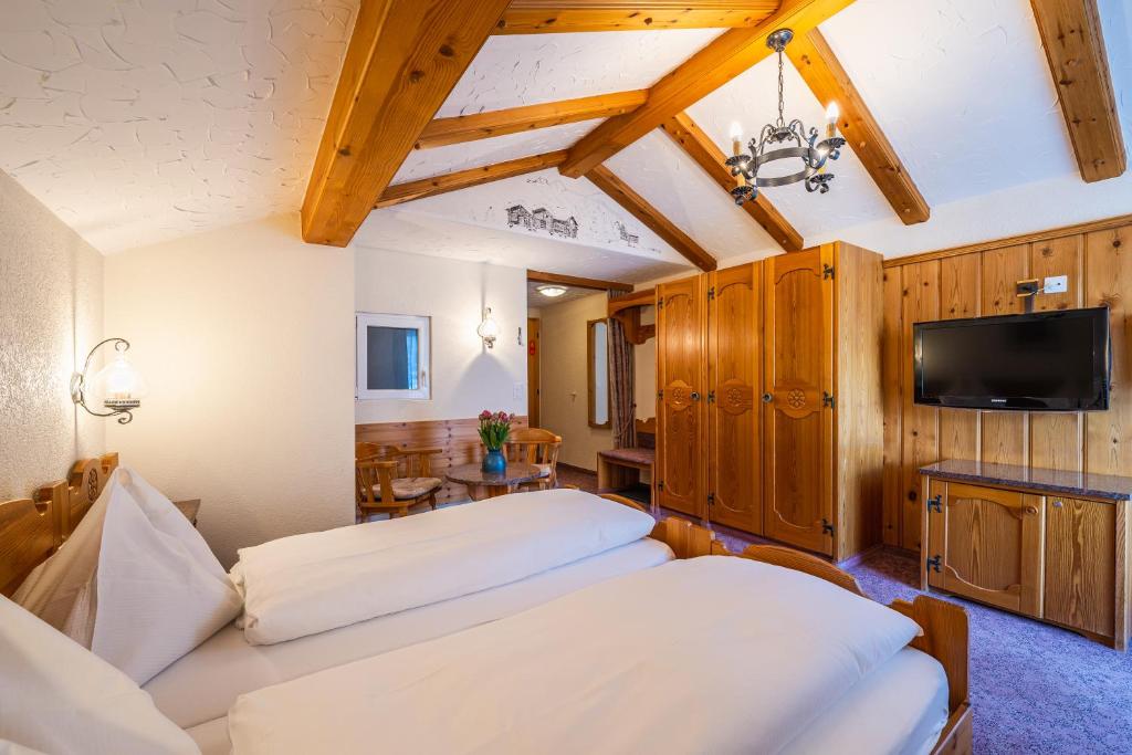 TV a/nebo společenská místnost v ubytování Hotel Christiania Saas-Fee