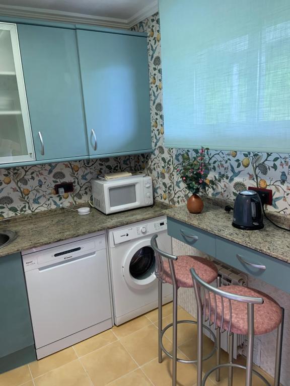 Kuchyň nebo kuchyňský kout v ubytování El BALCON DE BAKIO
