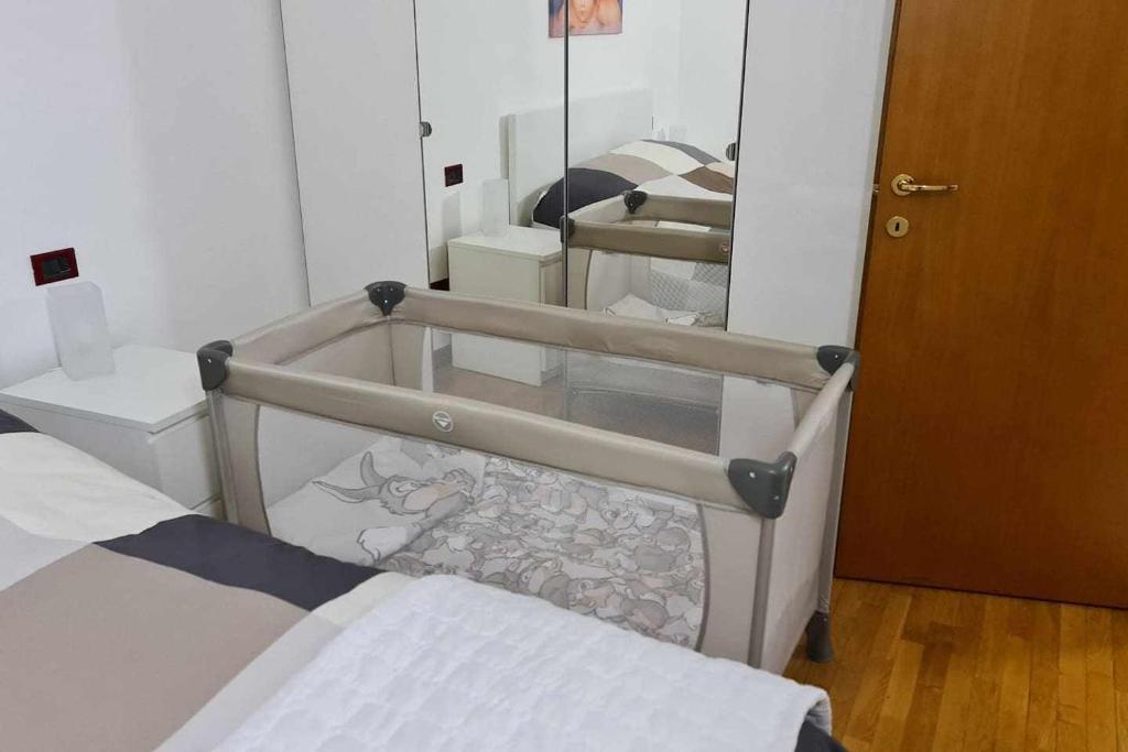 Łóżko lub łóżka w pokoju w obiekcie La Casa di Vale Suffragio