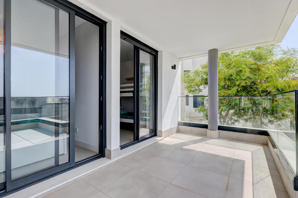 Bazén v ubytovaní Estepona Place - Spacious family city apartment alebo v jeho blízkosti