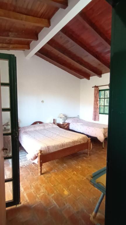 Postel nebo postele na pokoji v ubytování Casa Semilla Hospedaje de Montaña