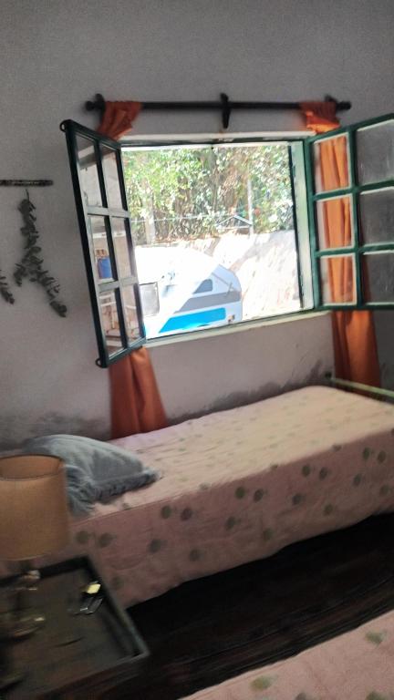 Postel nebo postele na pokoji v ubytování Casa Semilla Hospedaje de Montaña