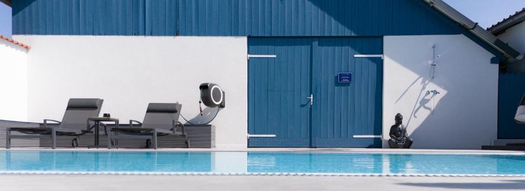Bazén v ubytování KRACHER Ferienhaus Landhaus No 1 - inklusive Pool nebo v jeho okolí