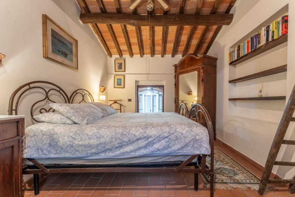 Postel nebo postele na pokoji v ubytování Mulino di Castelvecchio