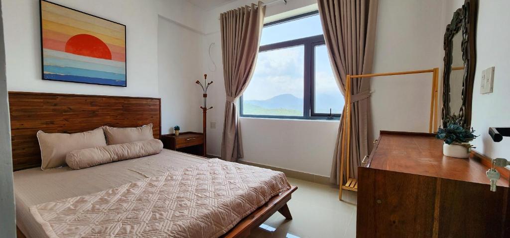 En eller flere senge i et værelse på Heritage Wooden Homestay