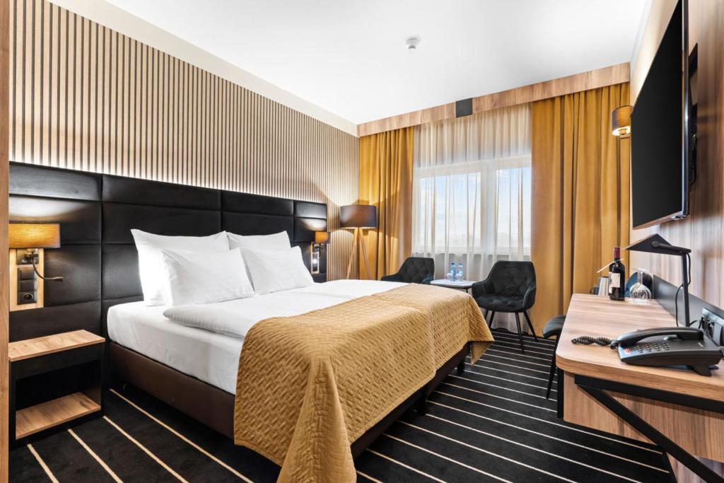 Postel nebo postele na pokoji v ubytování Park Hotel Diament Wroclaw