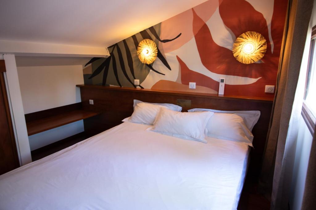 Postel nebo postele na pokoji v ubytování Residence Castell'Verde