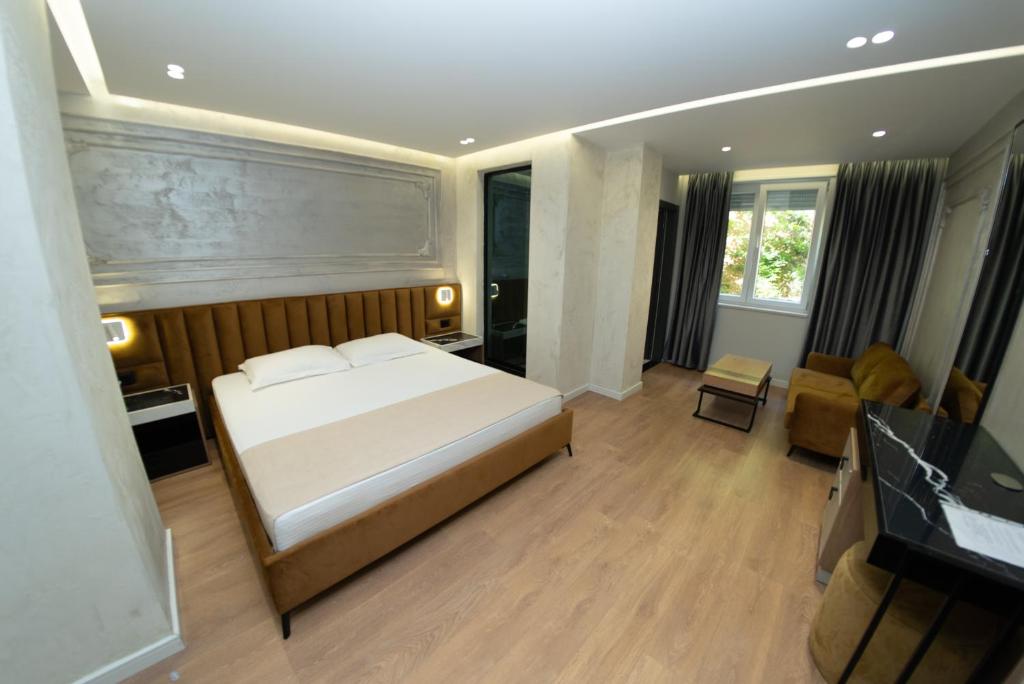 Postel nebo postele na pokoji v ubytování Hotel Monopoly