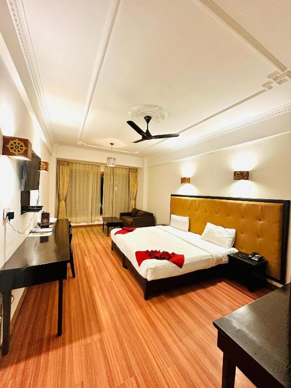 Postel nebo postele na pokoji v ubytování Hotel Migmar